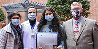 Youth volunteer Serena Parmar proudly displays her VA Youth Volunteer award with (left to right) her parents, Dr. Deepti Parmar, Dr. Raj Parmar and Don Van Borsch, Knights of Columbus