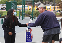 Student assisting a Veteran